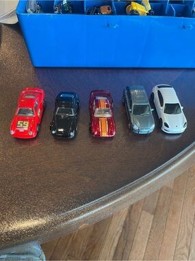 Set a five 1/64 scale diecast cars Porsche